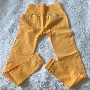 Gymshark yellow/gold leggings NWOT